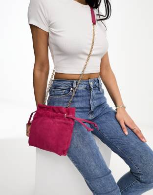 River Island drawstring suede bag in dark pink | ASOS