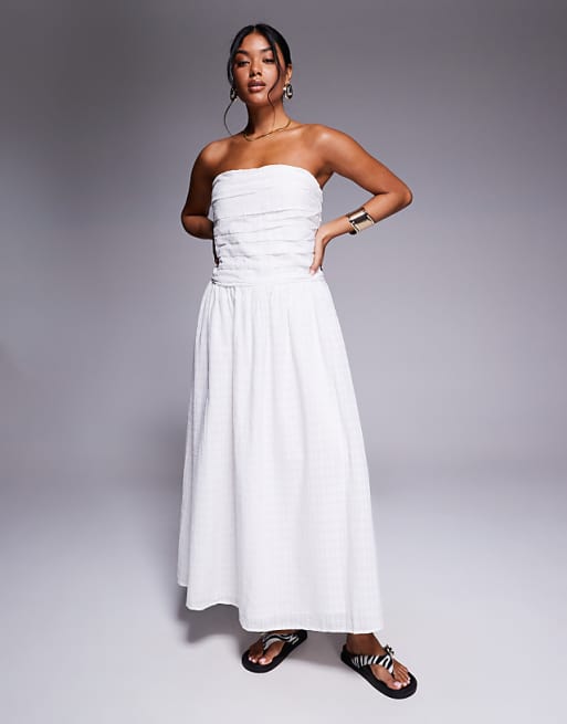 bandeau midi dress Strapless Satin Cowl Back The ASOS DESIGN bandeau midi dress in chocolate combines elegance and comfort with its plain design and sophisticated side pleat details River Island - Midi Dress