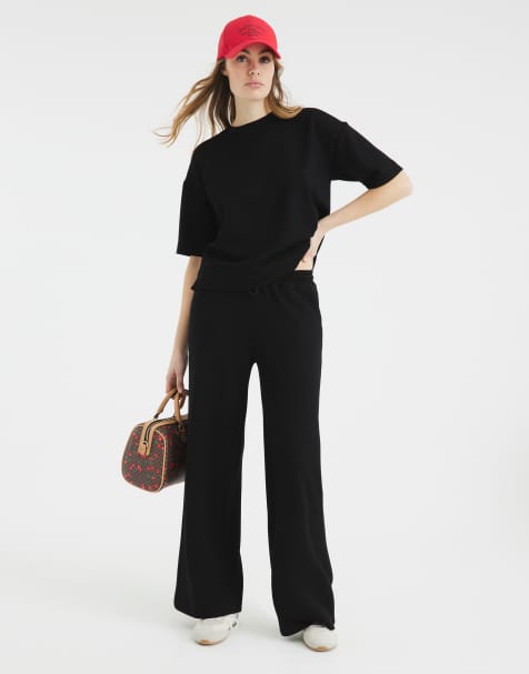 River Island - Effen joggingbroek met wijde pijpen in zwart - view 1