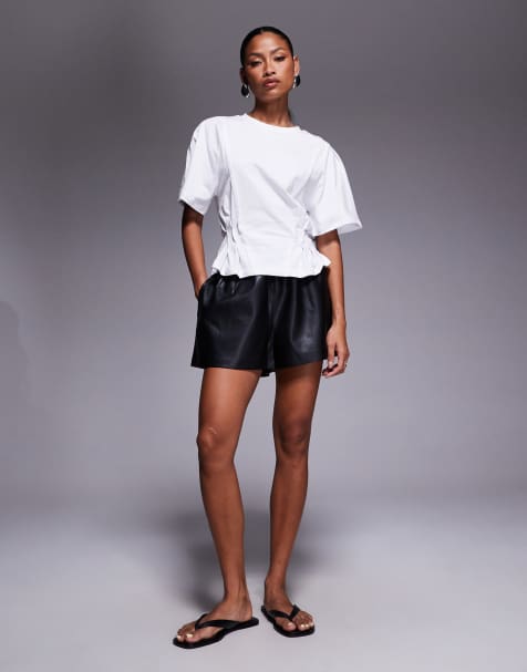 River Island elasticized faux leather shorts in black - view 1