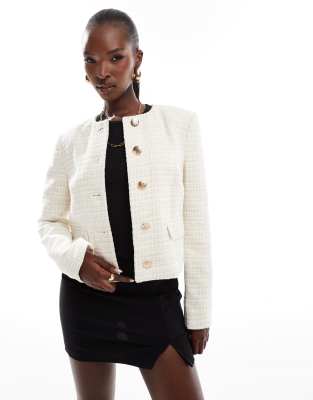 River Island - Elegante Bouclé-Jacke mit kurzem Schnitt in Creme-Weiß