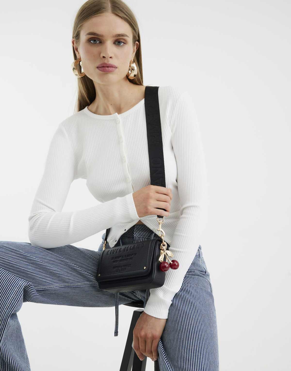 River Island Embossed flap cross body bag in black