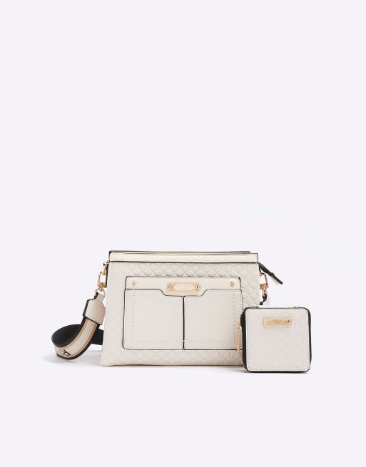 River Island Embossed monogram cross body bag in cream | ASOS