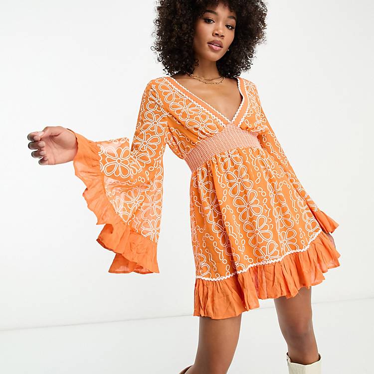 River Island embroidered ruffle hem mini beach dress with floaty sleeves in  orange