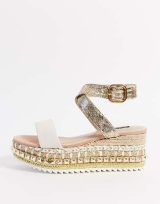 white studded flatforms