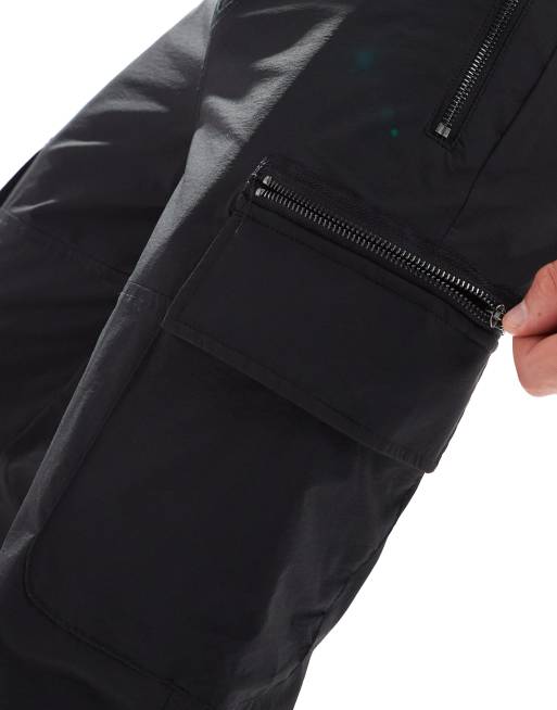 River Island – Eng geschnittene Cargohose in Schwarz, 3 von 5