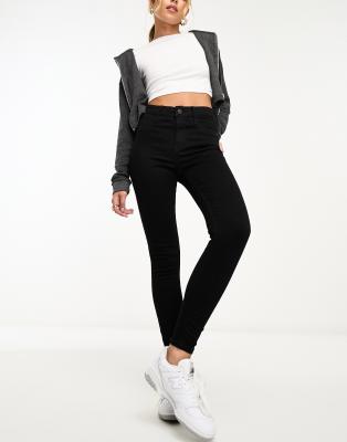 River Island - Eng geschnittene Jeans in Schwarz mit mittelhohem Bund