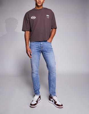 Enge Jeans in verwaschenem Mittelblau Blau W28 Short