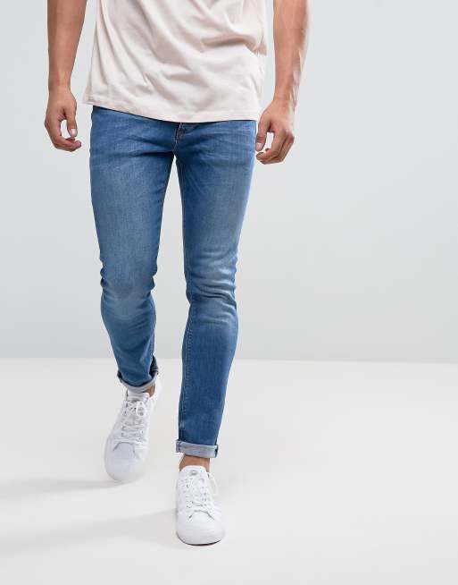 River Island – Enge Jeans in verwaschenem Mittelblau