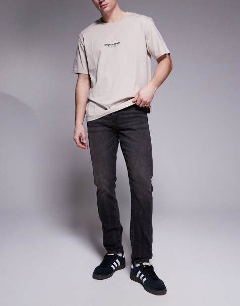 River Island – Enge Jeans in verwaschenem Schwarz - view 1
