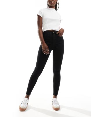 River Island - Enge Jeans mit hohem Bund in Schwarz