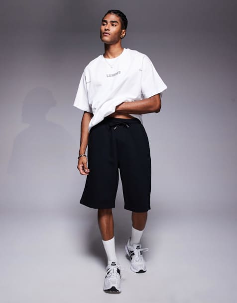 River Island essential wide leg jersey shorts in black - view 1