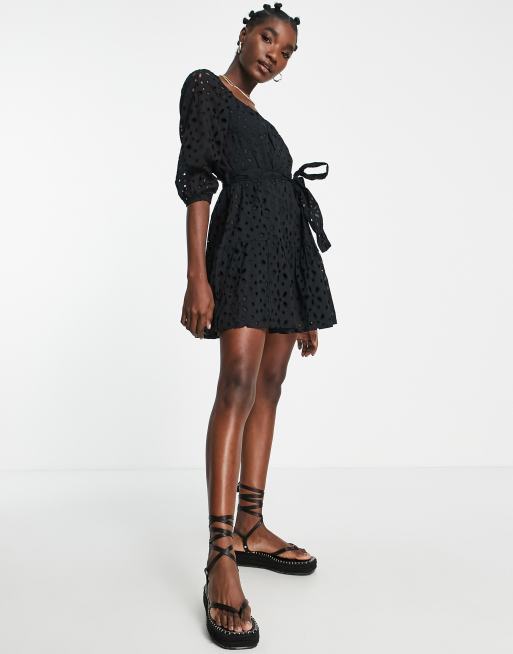 River Island eyelet belted mini dress in black ASOS