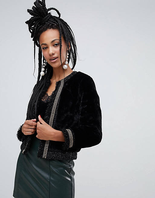 River Island faux fur jacket with chain detail in black | ASOS