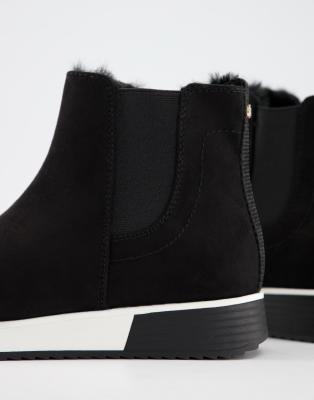 fur lined high top trainers