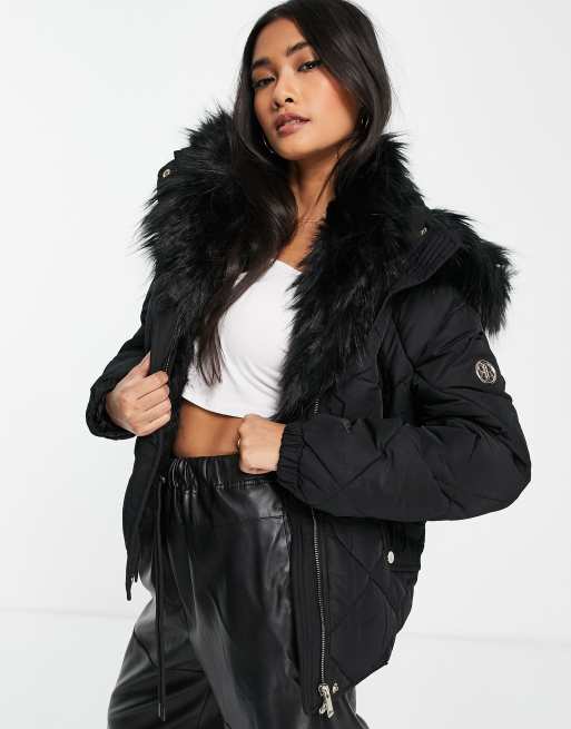 River Island faux fur lined padded jacket in black ASOS