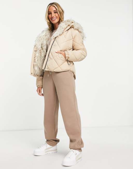 River Island faux fur lined padded jacket in neutral | ASOS