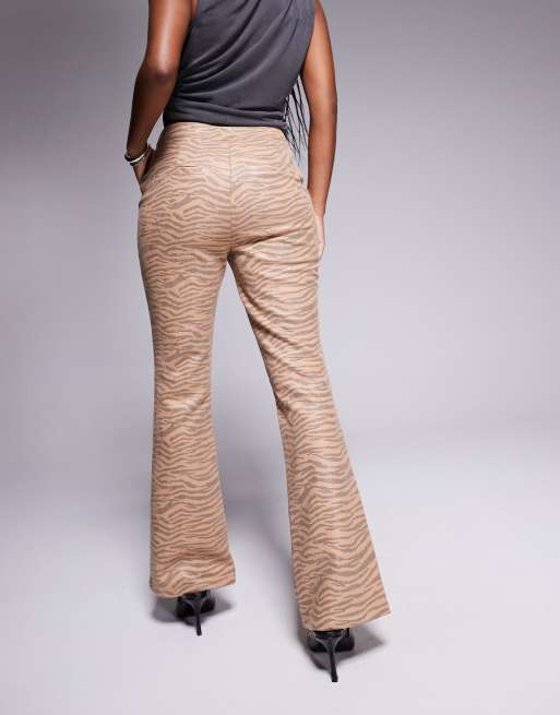 River Island faux leather bootleg trouser in tiger print, 2 of 5