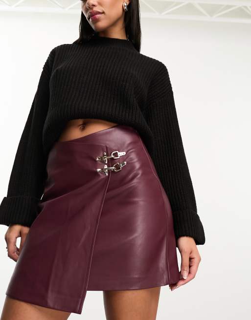 River Island Faux leather buckle wrap mini skirt in burgundy