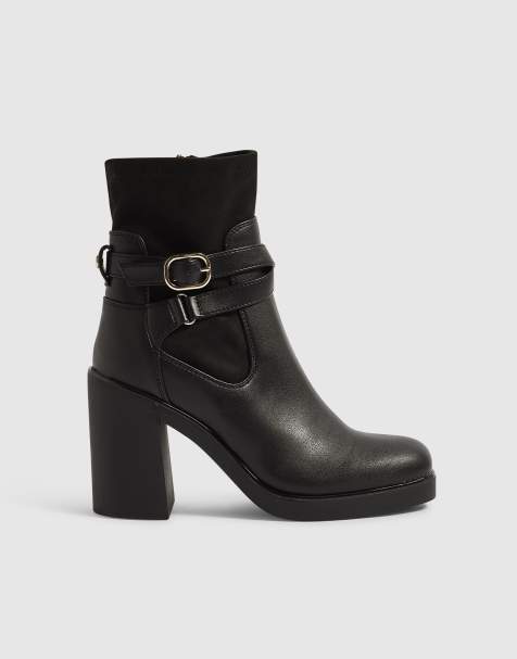 River Island Faux leather chunky buckle ankle boots in black - view 1