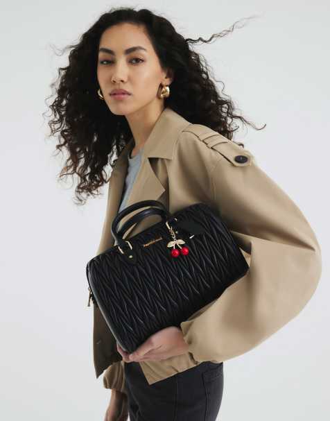 River Island Faux leather scrunch cross body bag in black - view 1