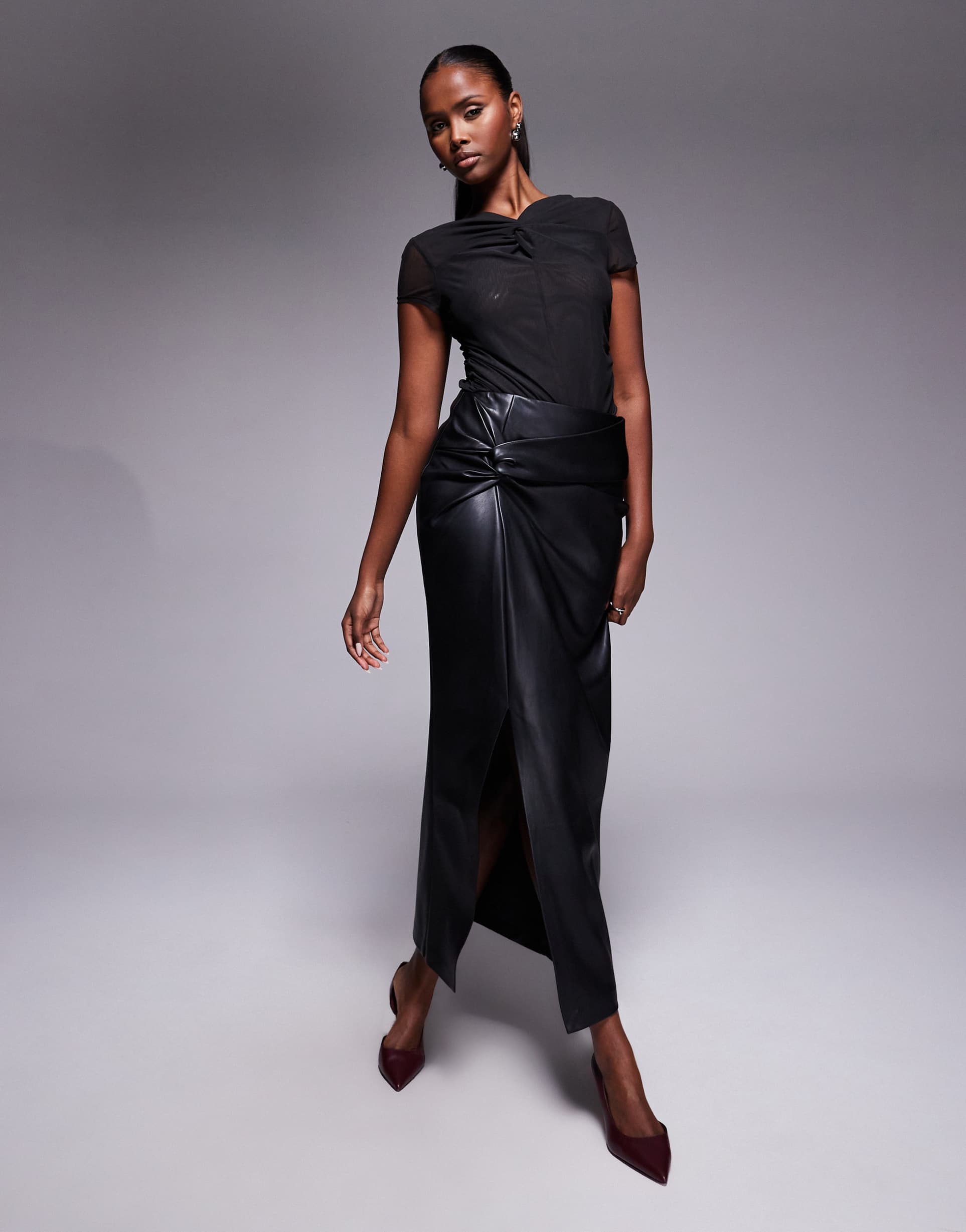 river island faux leather twist side midi skirt in black