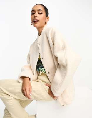 River Island faux wool bomber jacket in cream