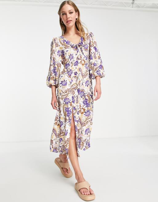 River Island – Fioletowa sukienka midi z wiązaniem na przodzie i wzorem w kwiaty