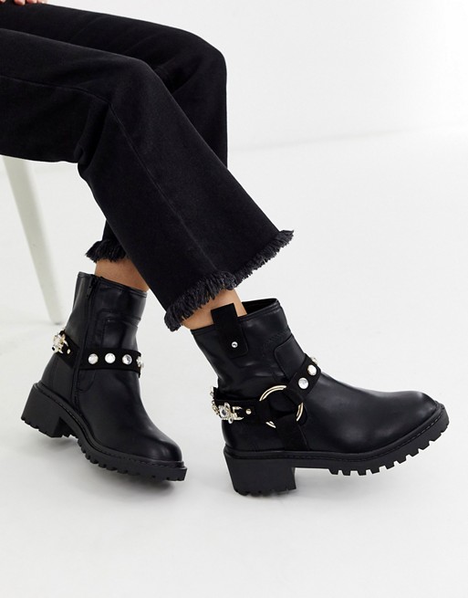 River Island flat boots with embellished straps in black | ASOS