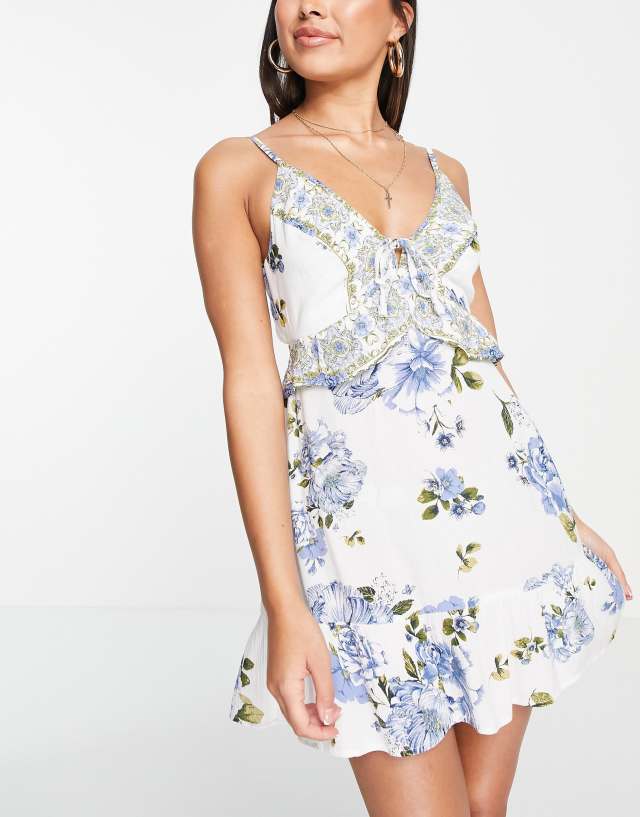 River Island floral frill mini beach dress in white