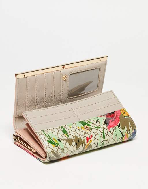 River Island floral print monogram clip top purse in beige