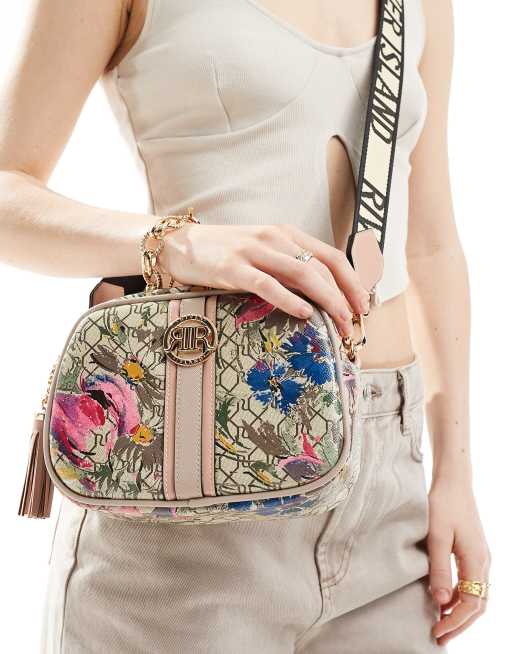 River Island floral print monogram cross body bag in beige ASOS