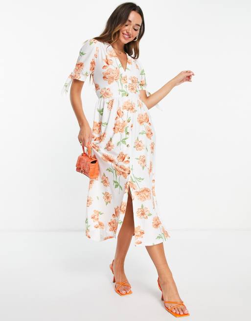 White and 2024 orange floral dress