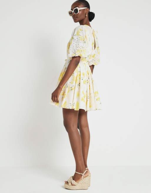 River Island Floral puff sleeve swing mini dress in yellow ASOS