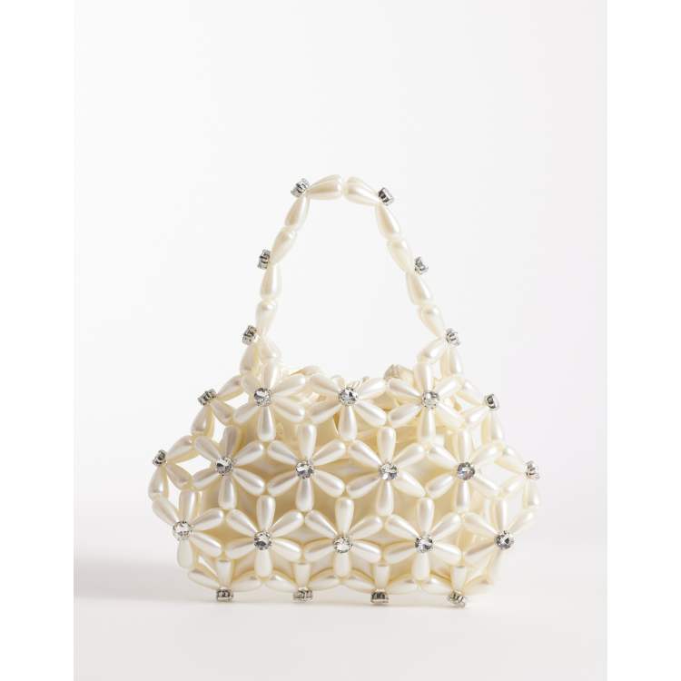 River Island flower pearl beaded grab bag in cream | ASOS