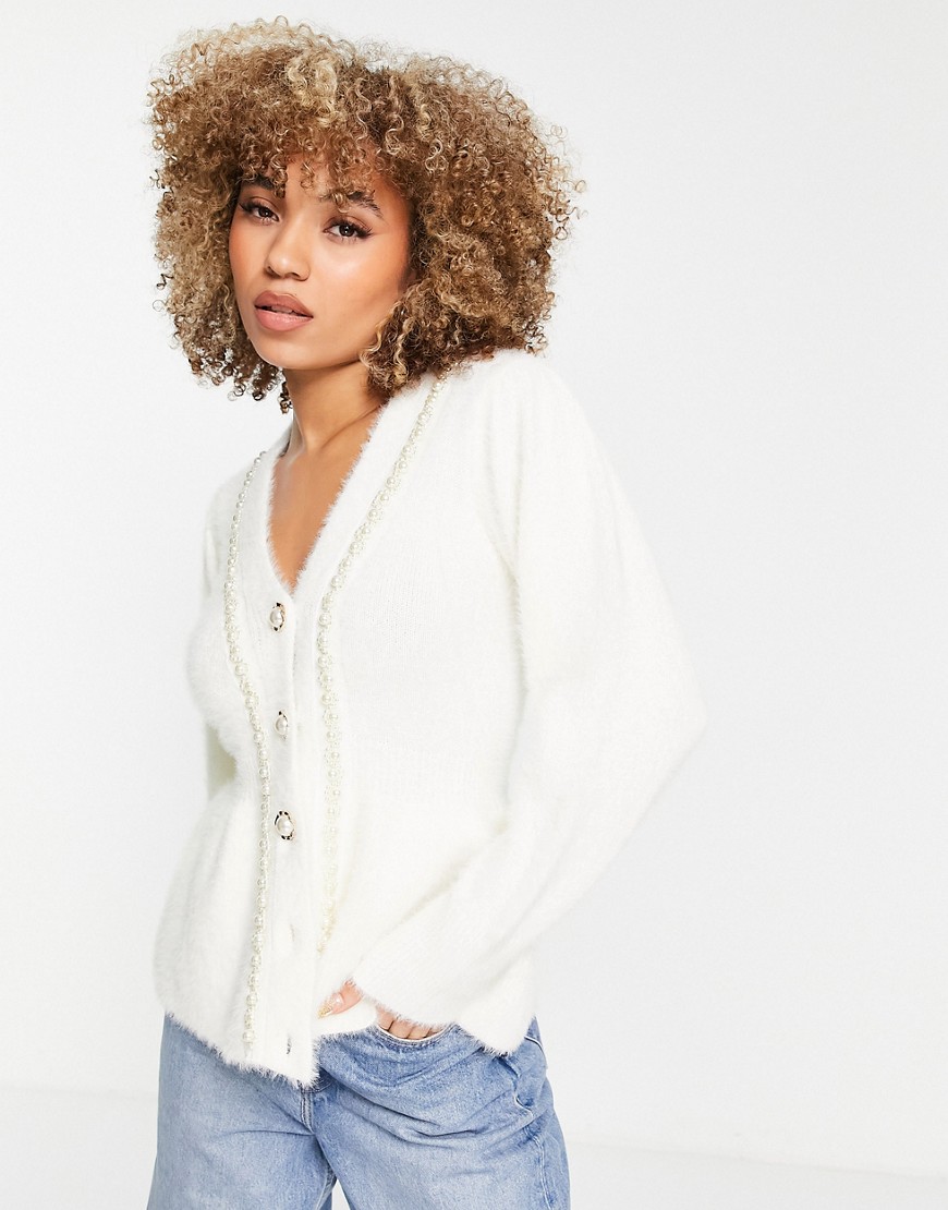 River Island fluffy peplum cardigan with pearl detail in cream-White