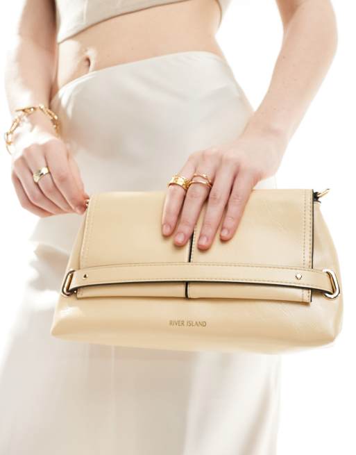 River Island fold over clutch in cream ASOS