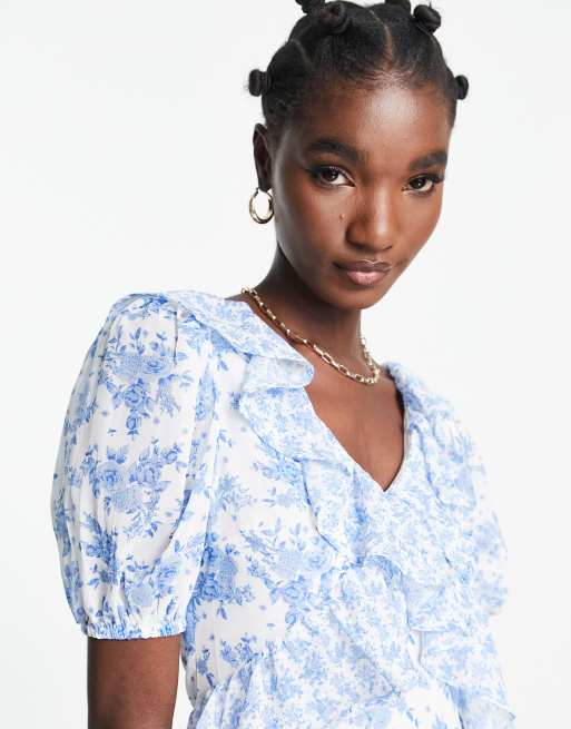 River Island frill asymmetric floral mini dress in blue ASOS