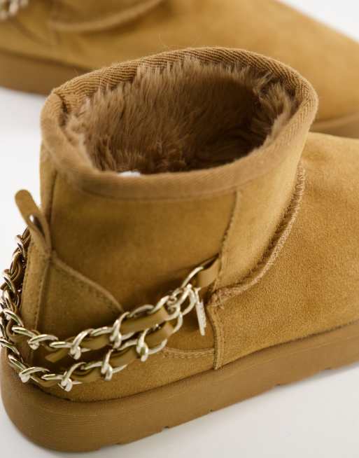 Ugg style store boots river island