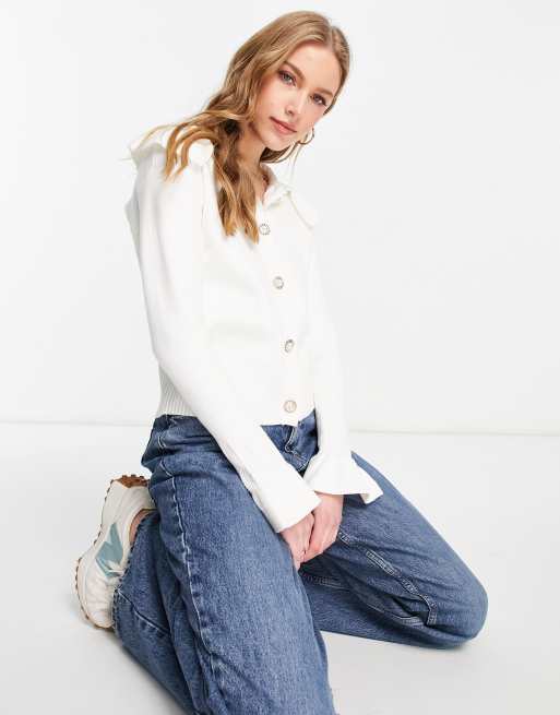 River Island - Gilet en maille avec col à volants - Ivoire