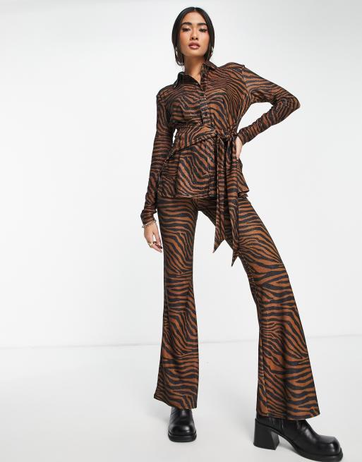 ASOS DESIGN plisse flare pants in animal print