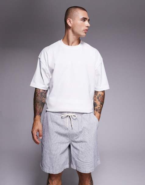 River Island – Granatowe wciągane szorty w paski - view 1