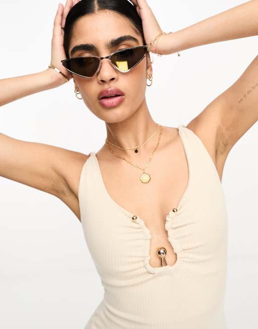 River Island – Guldfärgade, smala solglasögon i cateye-modell utan bågar