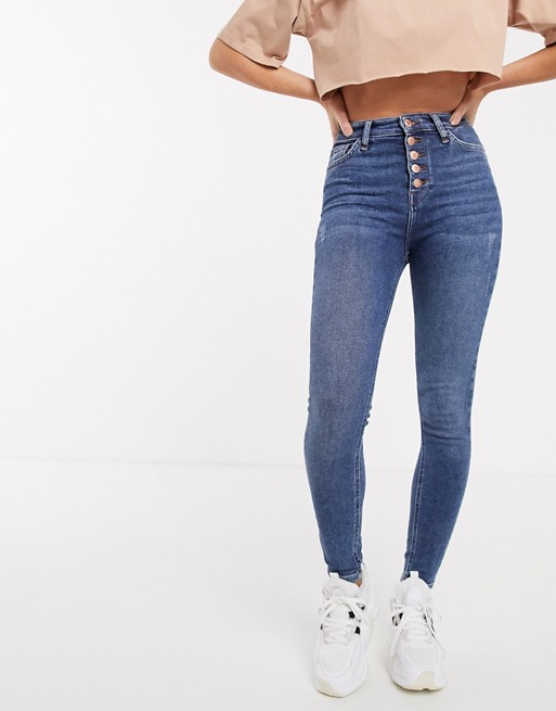 River Island Hailey skinny jeans with button detail in mid wash
