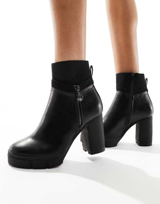 Black heeled shop boots river island