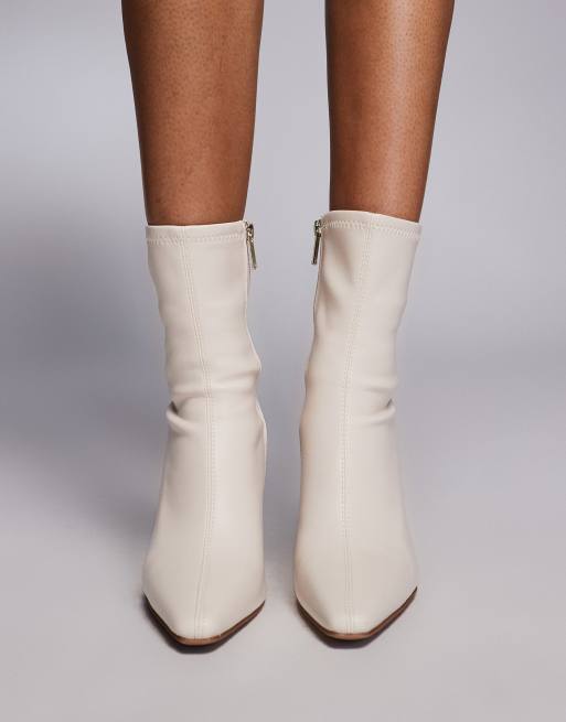 River Island heeled boots in cream ASOS