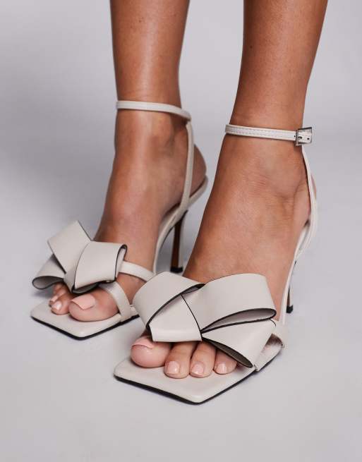 River Island heeled sandal with bow detail in cream ASOS