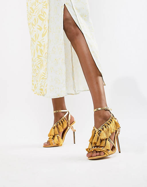 River Island heeled sandals with tassel details in yellow