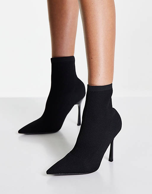 Women Boots/River Island heeled sock boot in black 
