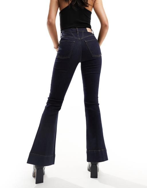 River Island high rise flared jeans in mid-blue, 2 of 5